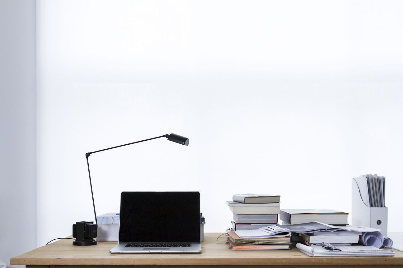 Laptop and lamp on desk